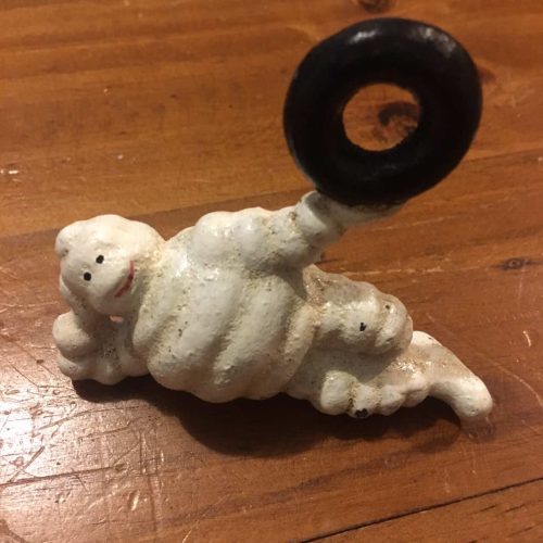 Cast Iron Michelin Man Lying Down