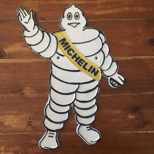 Michelin Man Waving Sign